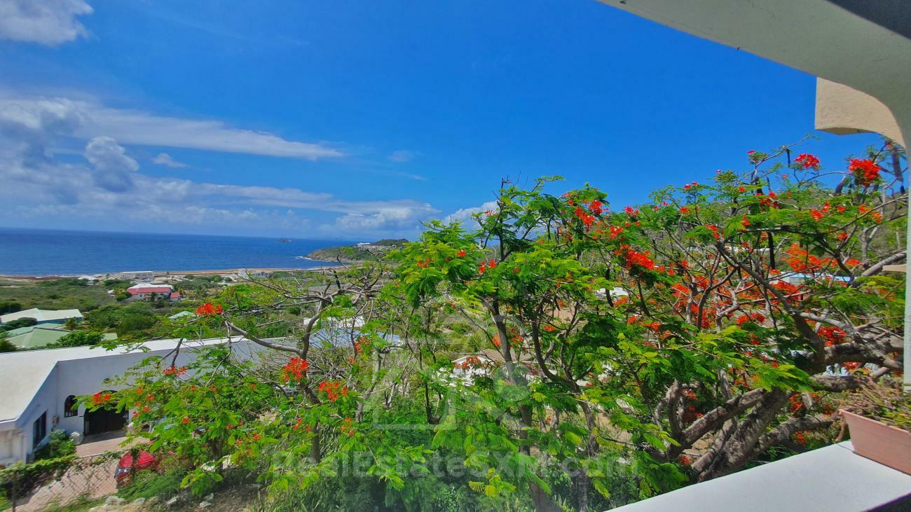 House for sale in St Maarten Guana Bay. Amazing ocean views. 3-levels, extra room PRICE DROP! No HOA
