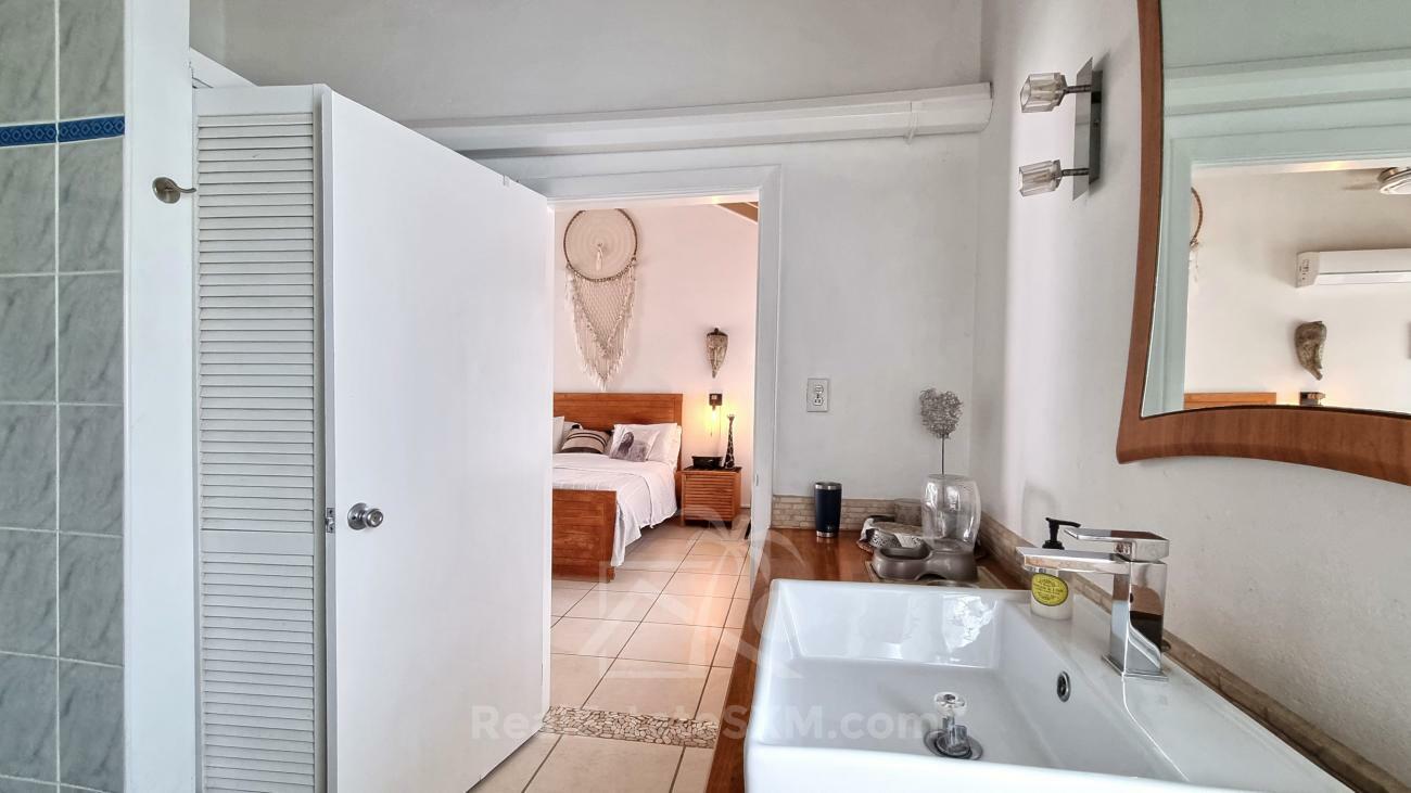 3-bedroom + Studio condo in Sint Maarten, Cupecoy, Tradewinds. Two levels, walking distance to beach