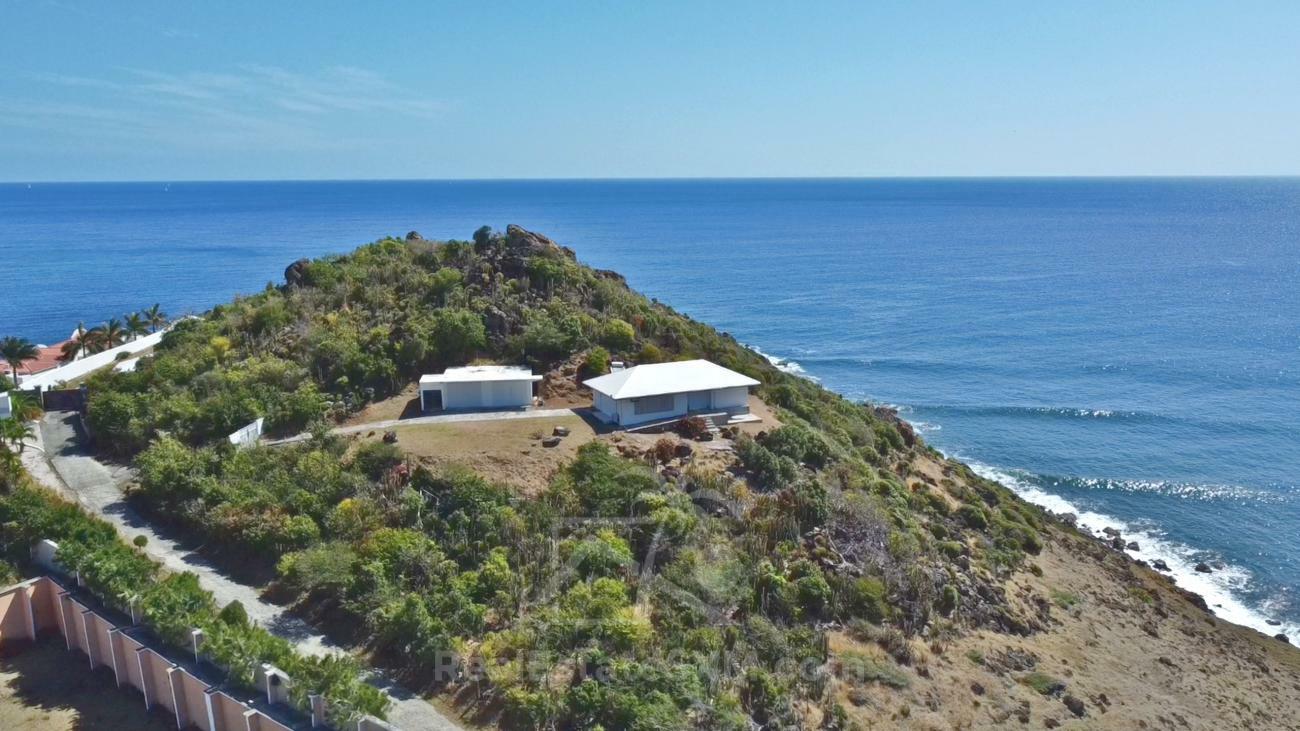 Top of the hill. Large 12130sqm land for sale in Guana Bay, St Maarten, Caribbean with house