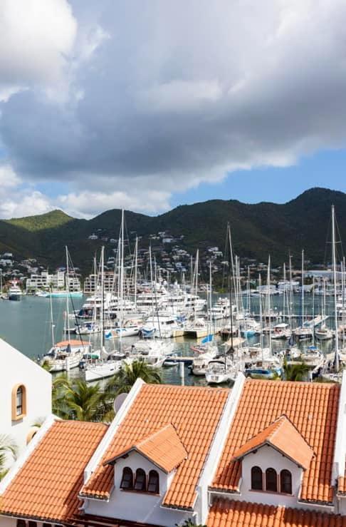 Luxury home for sale St Maarten in prestigious Simpson Bay Yacht Club. Tennis court. 24/7 security