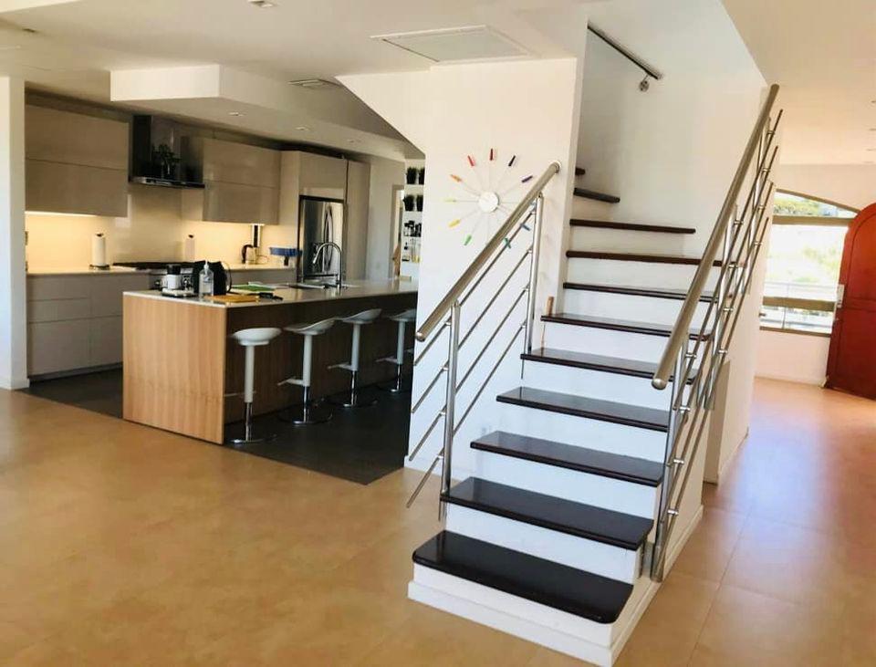 Luxury home for sale St Maarten in prestigious Simpson Bay Yacht Club. Tennis court. 24/7 security