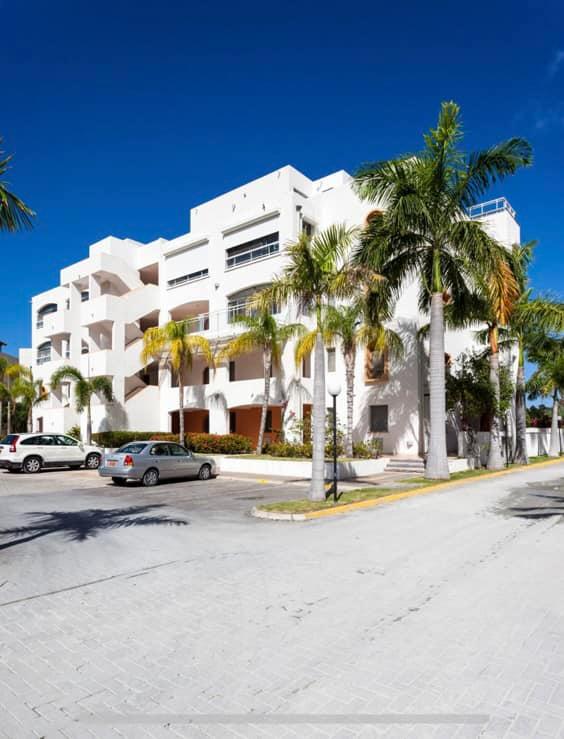 Luxury home for sale St Maarten in prestigious Simpson Bay Yacht Club. Tennis court. 24/7 security