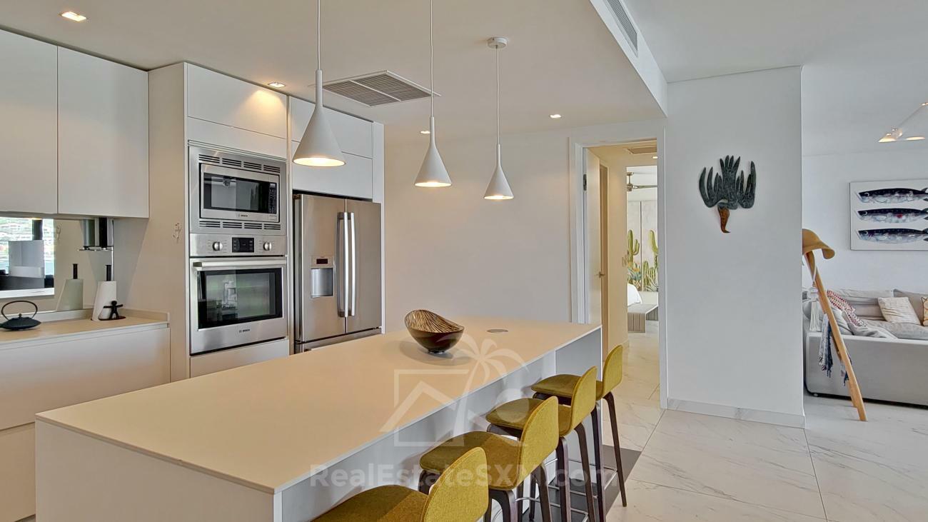 Luxury 3 bedrooms condo for sale in St Maarten Las Brisas. Waterfront. Swimming pool. Gym. Boat slip