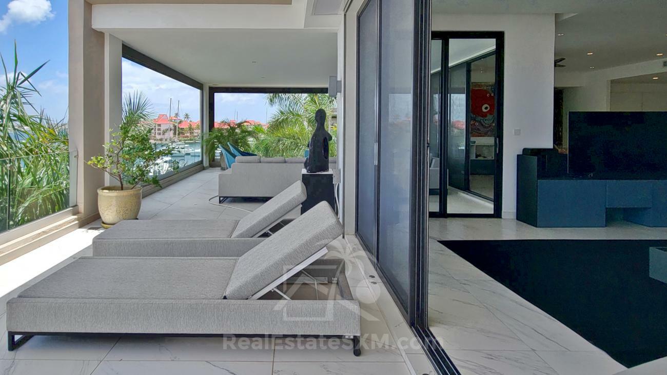 Luxury 3 bedrooms condo for sale in St Maarten Las Brisas. Waterfront. Swimming pool. Gym. Boat slip