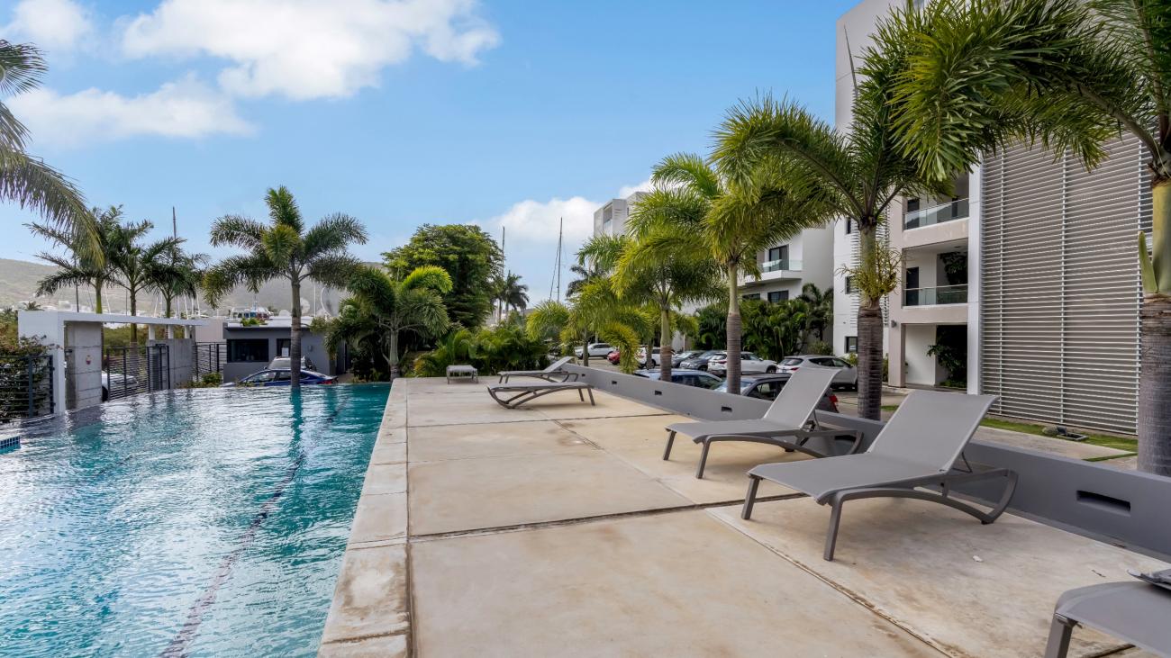 Luxury 3 bedrooms condo for sale in St Maarten Las Brisas. Waterfront. Swimming pool. Gym. Boat slip