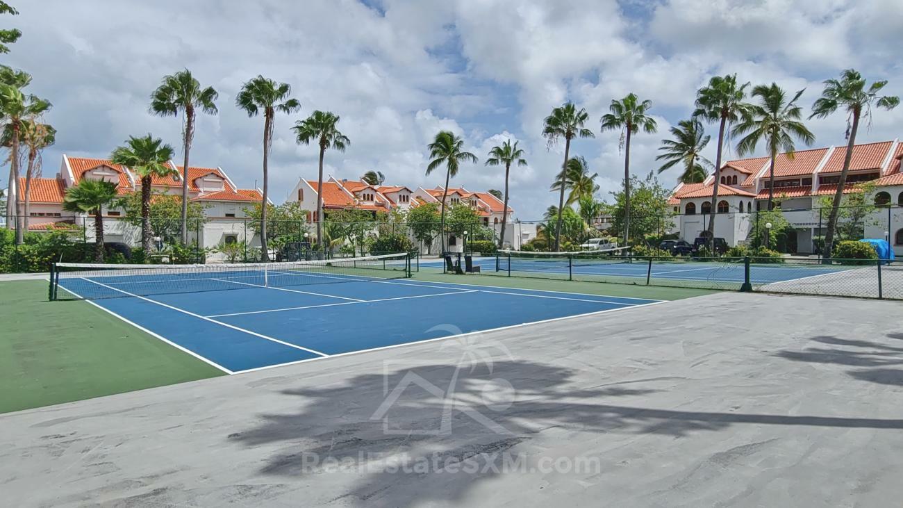 Condo for rent Sint Maarten. Prestigious location Simpson Bay Yacht Club. Tennis courts. Water front