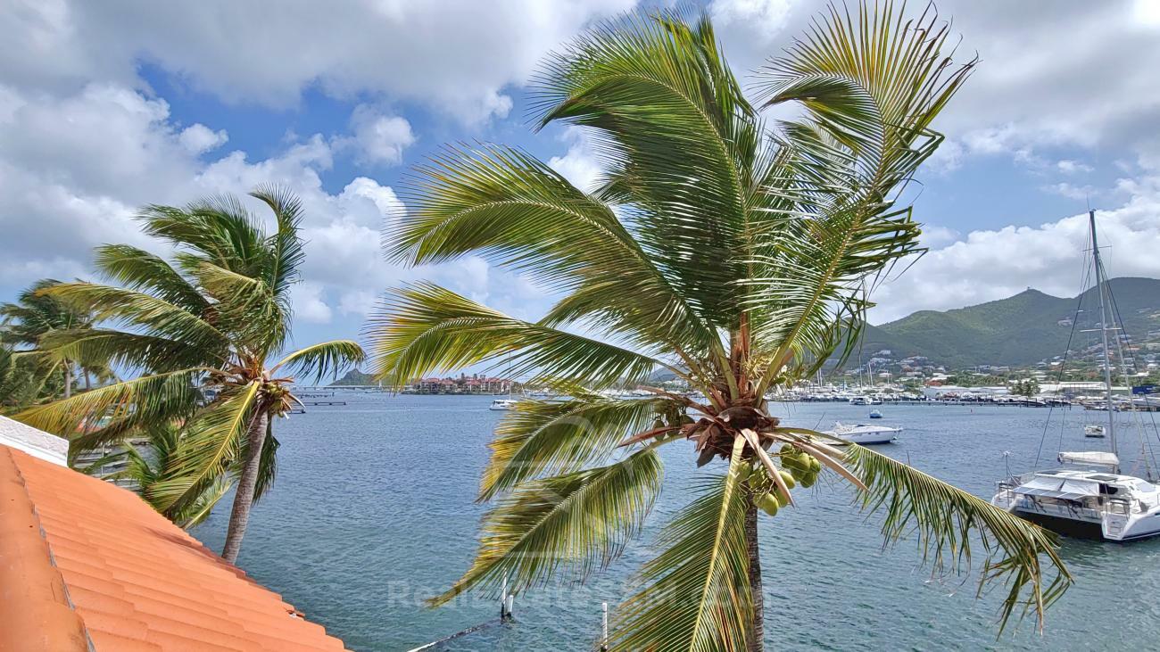 Condo for rent Sint Maarten. Prestigious location Simpson Bay Yacht Club. Tennis courts. Water front