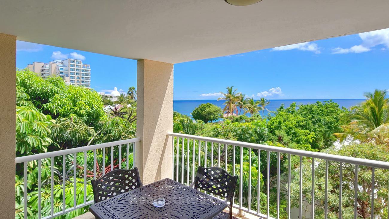 2 bedrooms condo for SALE St Maarten Cupecoy Sapphire Hotel. Caribbean Sea view. 3 balconies (230)