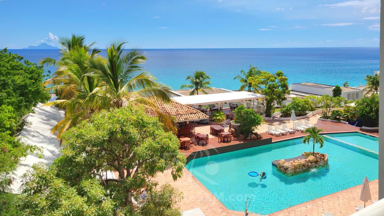 2 bedrooms condo for SALE St Maarten Cupecoy Sapphire Hotel. Caribbean Sea view. 3 balconies (230)