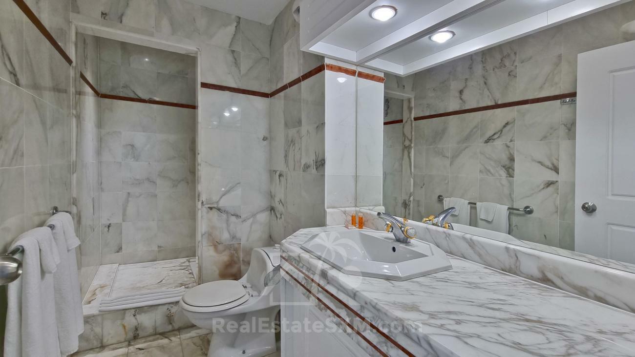 St Maarten: 1 bedroom apartment for sale 8th floor Sapphire Hotel Cupecoy. Lagoon View. (386)