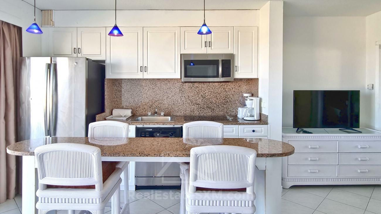 St Maarten: 1 bedroom apartment for sale 8th floor Sapphire Hotel Cupecoy. Lagoon View. (386)