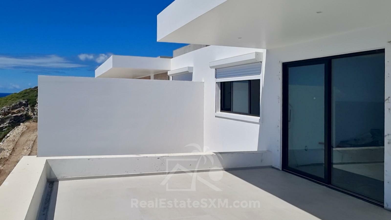  St Maarten condos for sale Point Blanche, Gabriel Residences on cliff, ocean view, pool, fitness