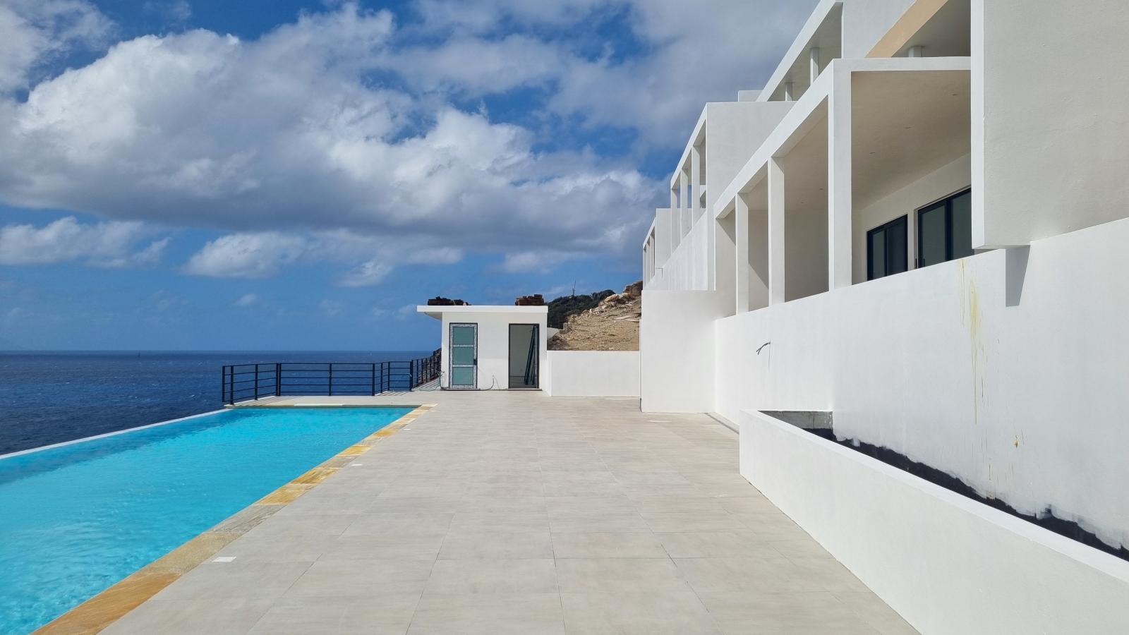 St Maarten condos for sale Point Blanche, Gabriel Residences on cliff, ocean view, pool, fitness