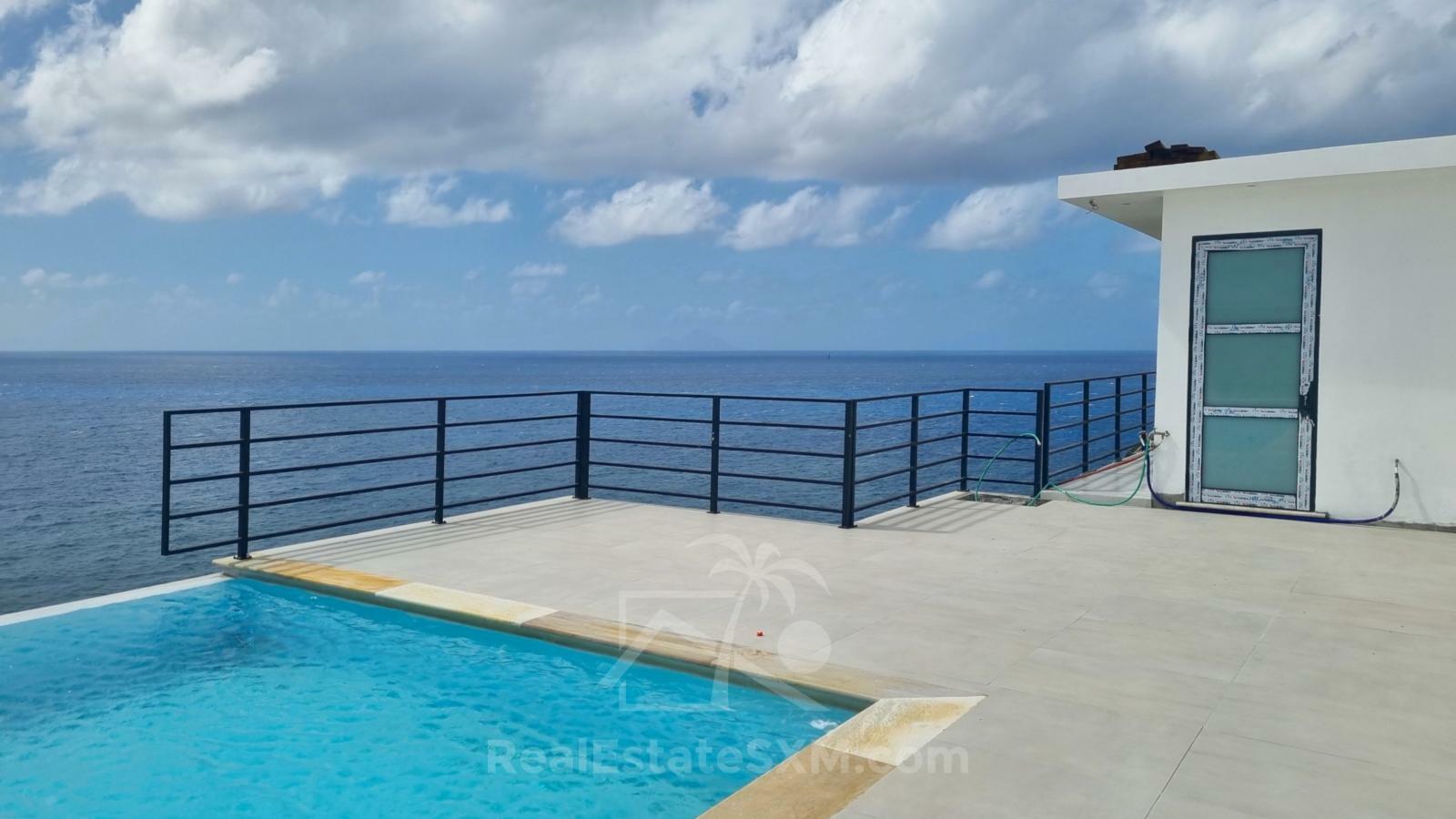  St Maarten condos for sale Point Blanche, Gabriel Residences on cliff, ocean view, pool, fitness