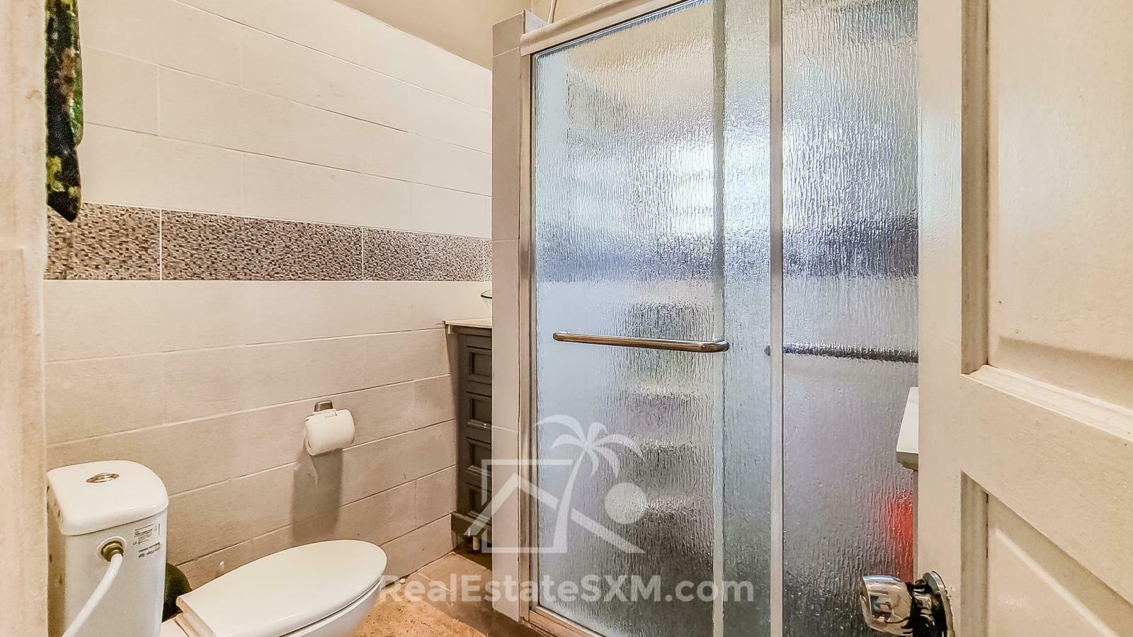 St Maarten house for sale in Point Blanche, 4 beds 4 baths. Gated yard. Garage