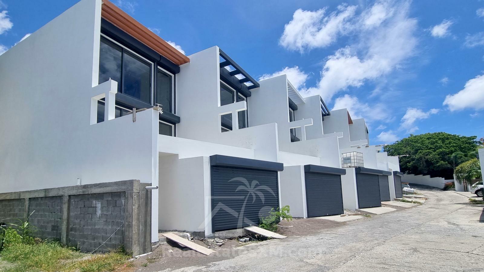 Homes for sale in St Maarten, Cupecoy. La Maddalena 3BR Townhouses with Lagoon view. 