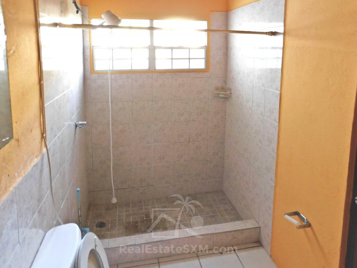 Apartment Building for sale Sint Maarten, Point Blanche. Two 1-bedrooms. Gated. 2 floors