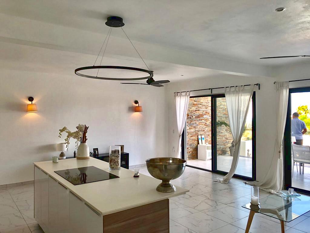 Home for rent St Maarten, 2BR modern condo in Guana Bay. Ocean and St Barts view. Gated. Vanina Res.