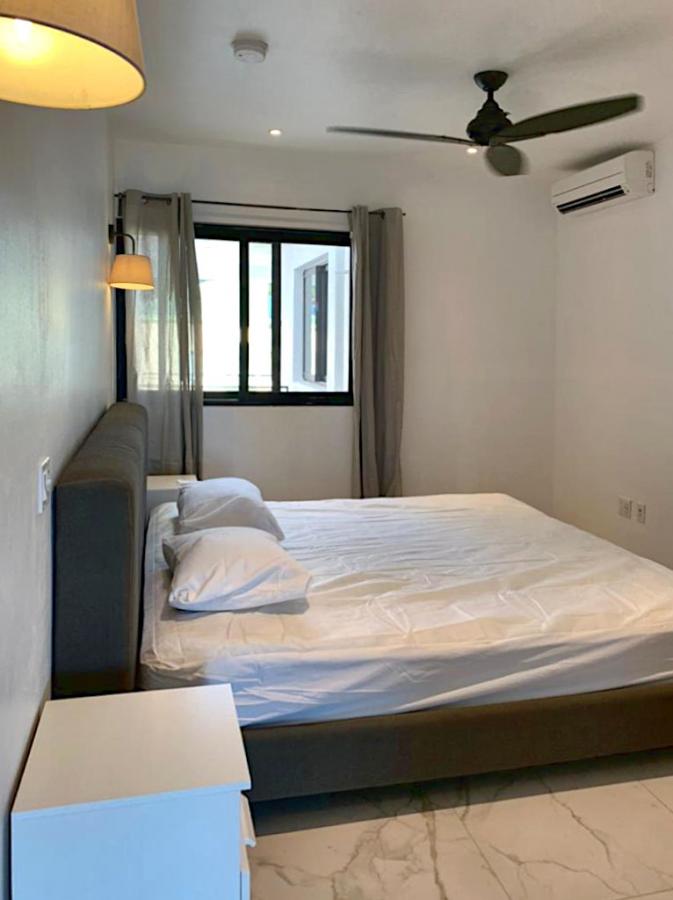 Home for rent St Maarten, 2BR modern condo in Guana Bay. Ocean and St Barts view. Gated. Vanina Res.