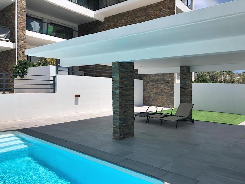 Home for rent St Maarten, 2BR modern condo in Guana Bay. Ocean and St Barts view. Gated. Vanina Res.