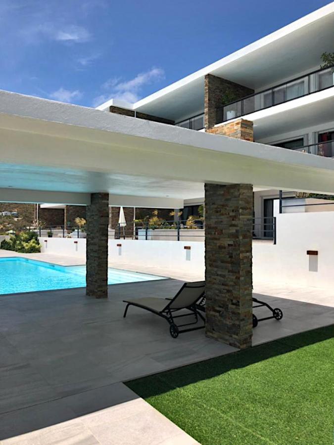 Home for rent St Maarten, 2BR modern condo in Guana Bay. Ocean and St Barts view. Gated. Vanina Res.