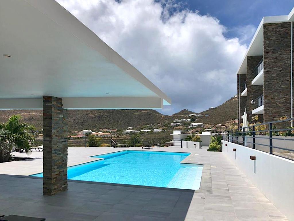 Home for rent St Maarten, 2BR modern condo in Guana Bay. Ocean and St Barts view. Gated. Vanina Res.
