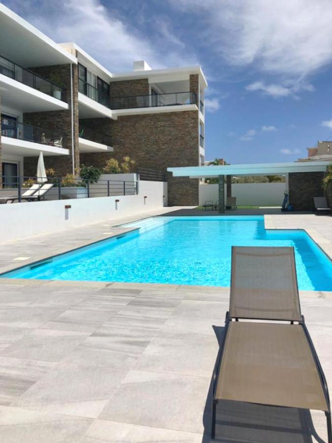 Home for rent St Maarten, 2BR modern condo in Guana Bay. Ocean and St Barts view. Gated. Vanina Res.