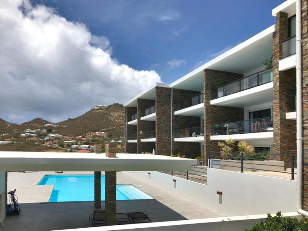 Home for rent St Maarten, 2BR modern condo in Guana Bay. Ocean and St Barts view. Gated. Vanina Res.