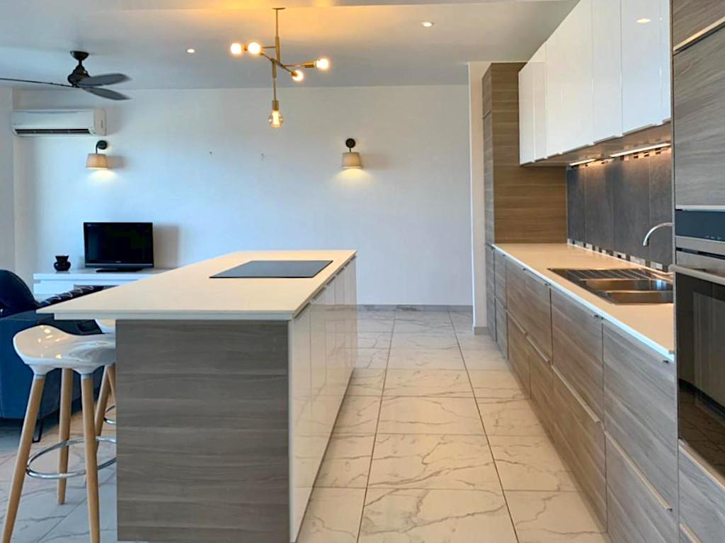 Home for rent St Maarten, 2BR modern condo in Guana Bay. Ocean and St Barts view. Gated. Vanina Res.
