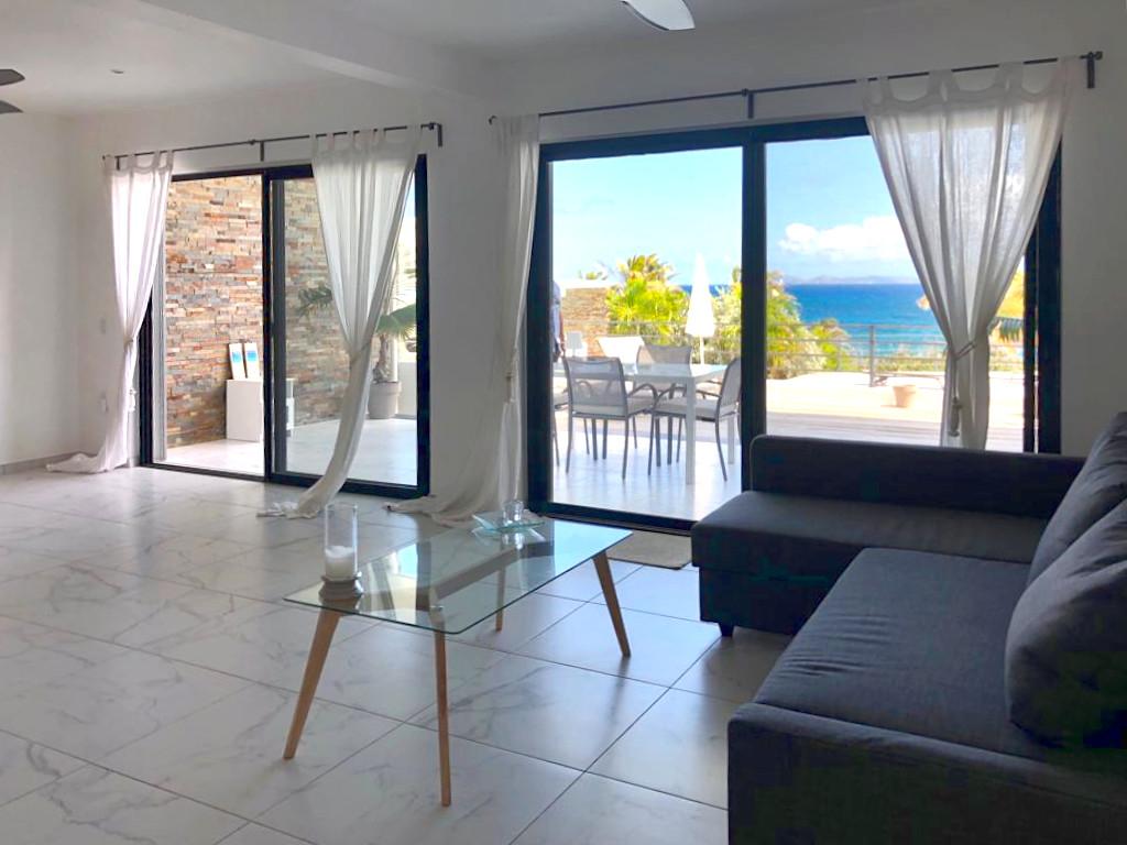 Home for rent St Maarten, 2BR modern condo in Guana Bay. Ocean and St Barts view. Gated. Vanina Res.