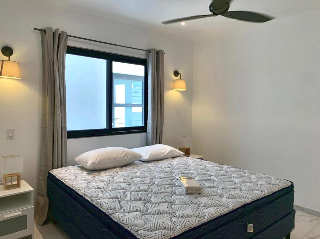 Home for rent St Maarten, 2BR modern condo in Guana Bay. Ocean and St Barts view. Gated. Vanina Res.