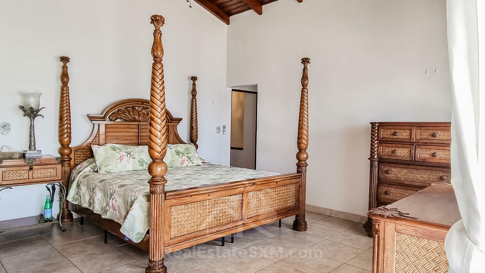 Waterfront Caribbean Villa for sale St Maarten, Beacon Hill. 2 bedrooms + Studio. Beach view. Boats
