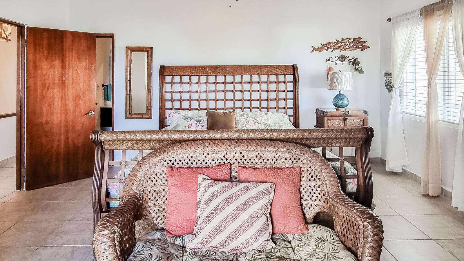 Waterfront Caribbean Villa for sale St Maarten, Beacon Hill. 2 bedrooms + Studio. Beach view. Boats