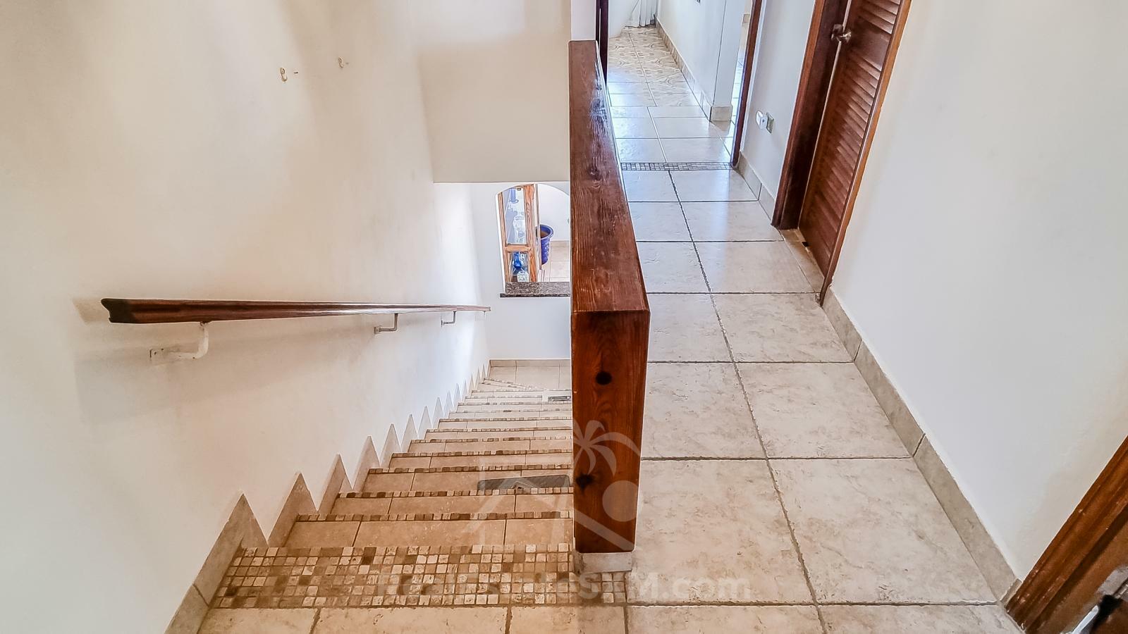 Waterfront Caribbean Villa for sale St Maarten, Beacon Hill. 2 bedrooms + Studio. Beach view. Boats
