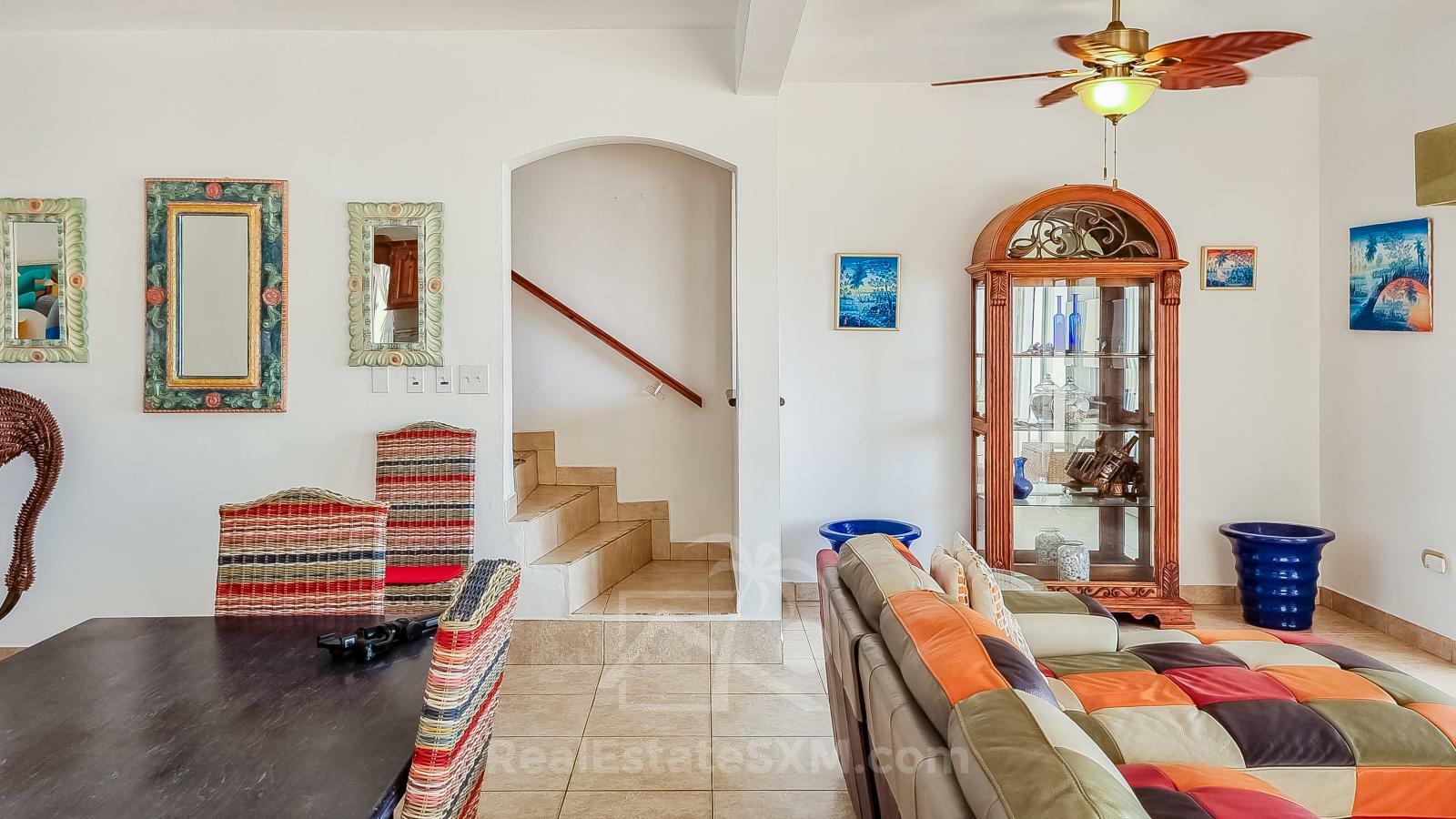 Waterfront Caribbean Villa for sale St Maarten, Beacon Hill. 2 bedrooms + Studio. Beach view. Boats