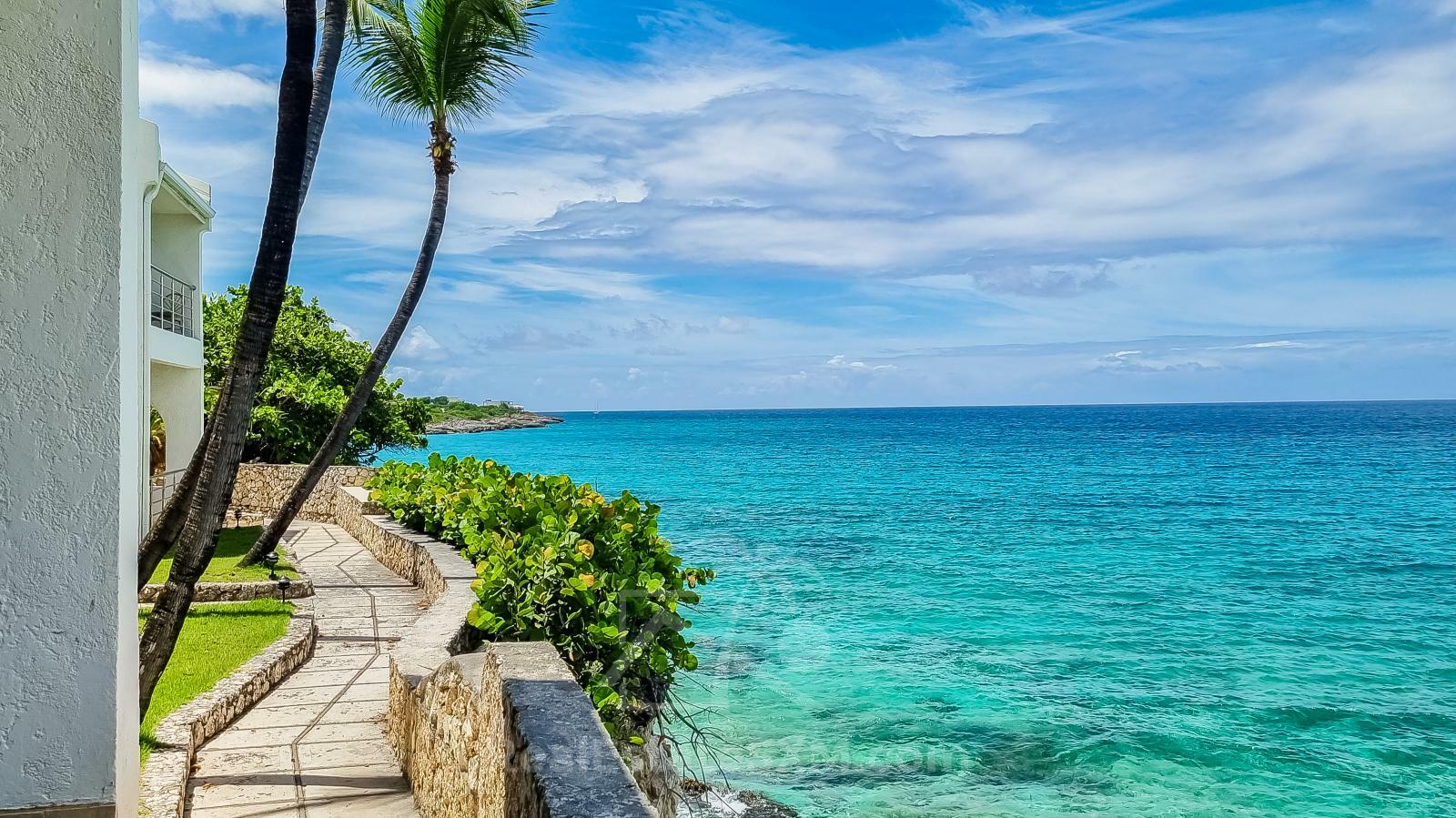 Ocean-front 2BR Spacious Apartment For Rent St Maarten Cupecoy Beach Club. Sunsets. Quiet. Gated