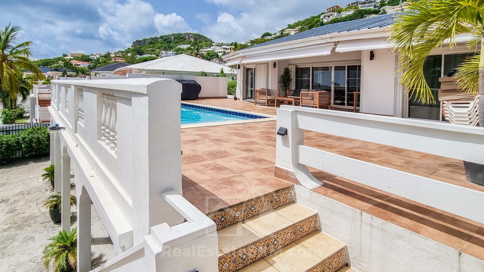 Caribbean Villa Domila for sale in St Maarten, Pelican Key. Ocean view & Sunsets. Rental income