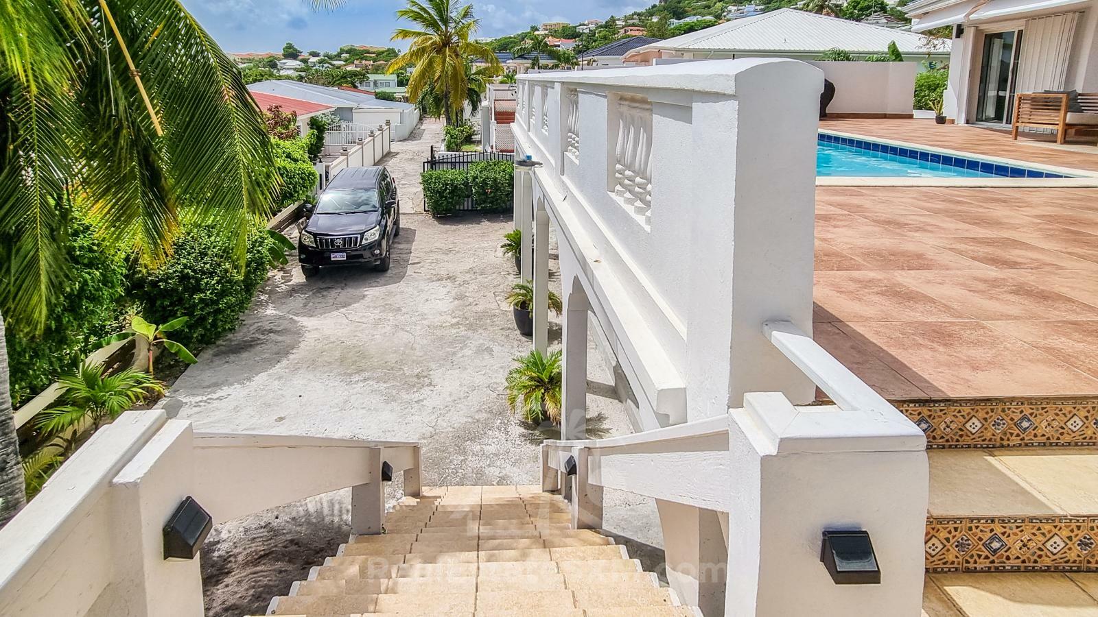 Caribbean Villa Domila for sale in St Maarten, Pelican Key. Ocean view & Sunsets. Rental income