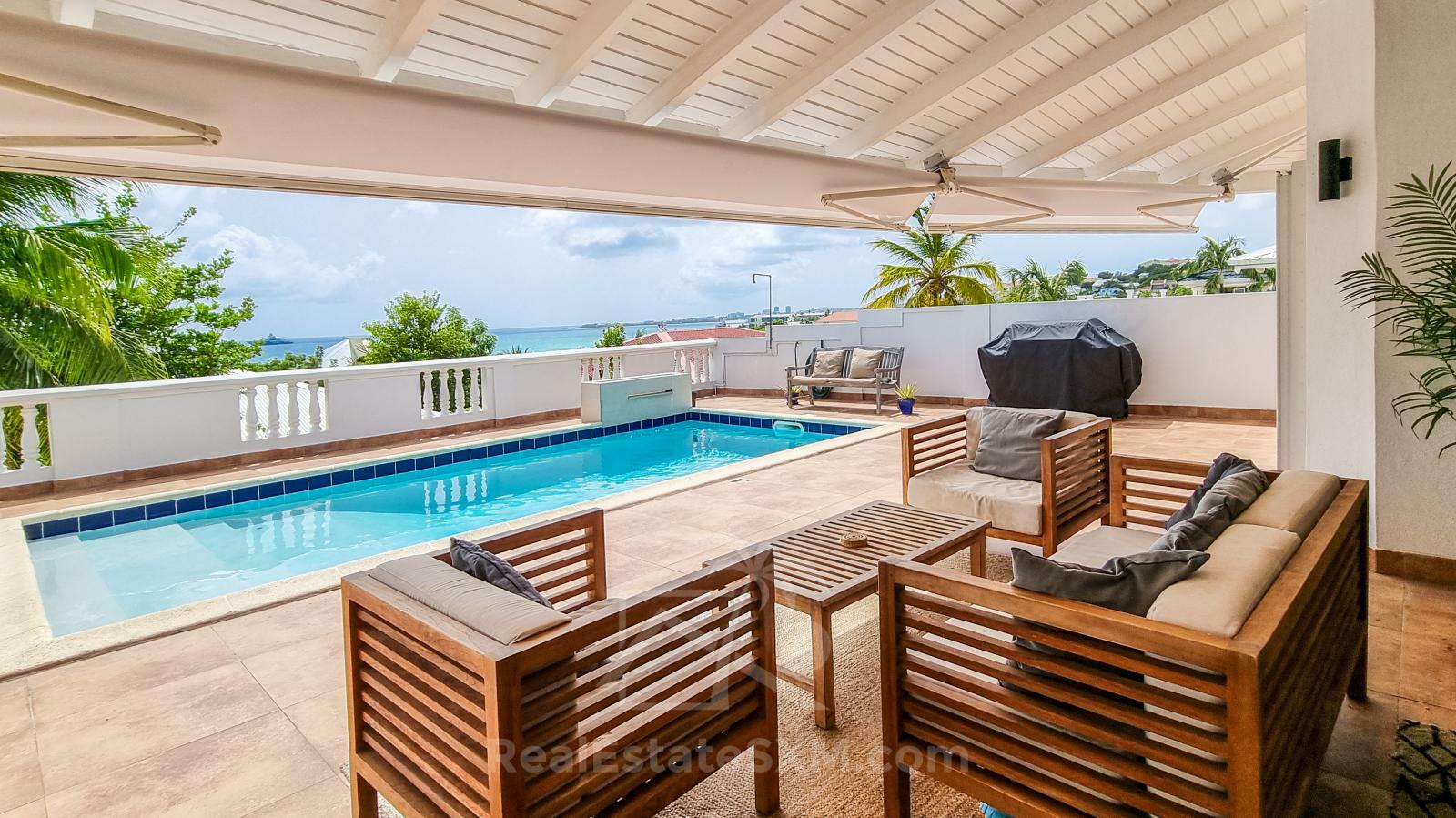 Caribbean Villa Domila for sale in St Maarten, Pelican Key. Ocean view & Sunsets. Rental income