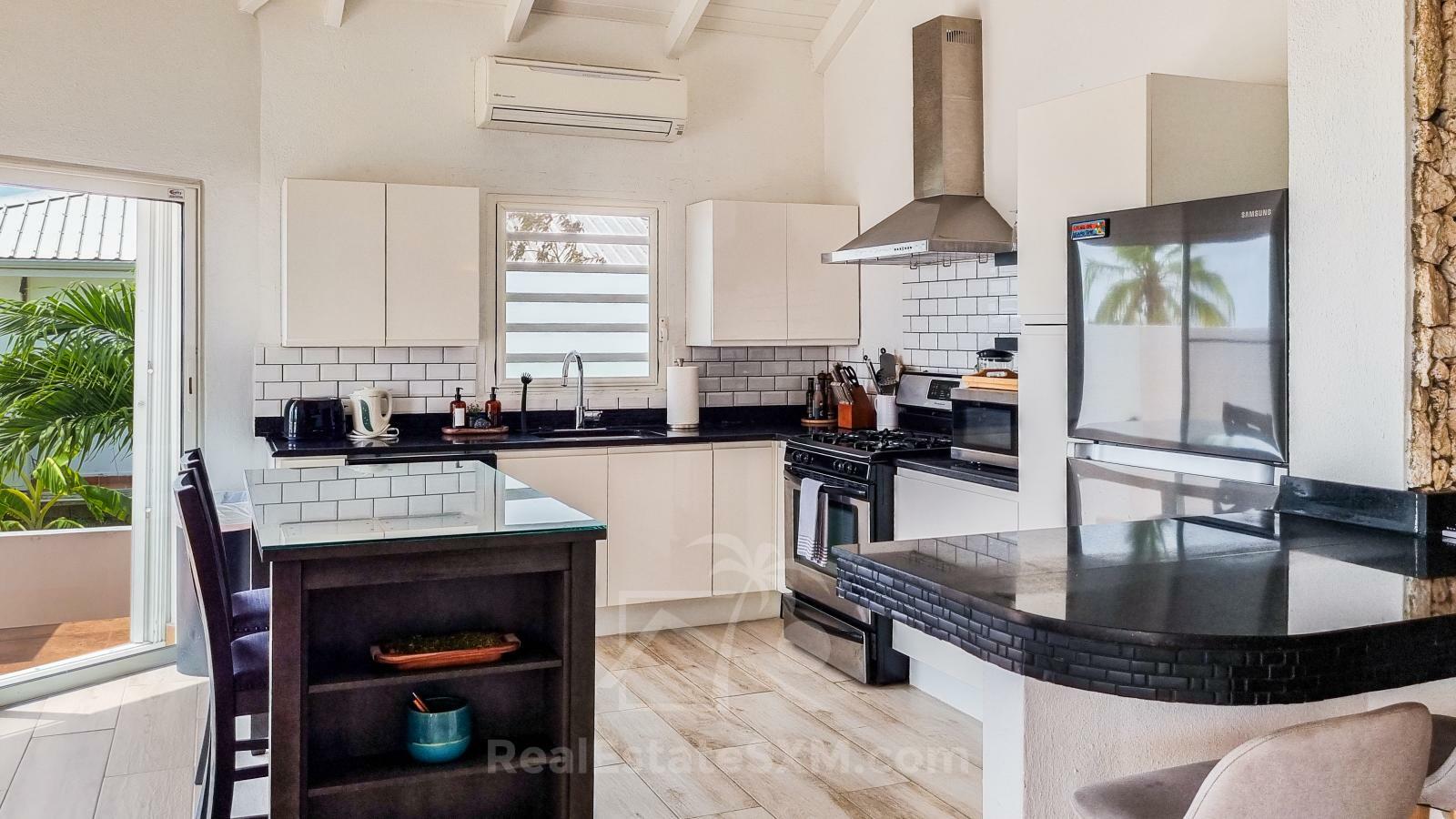 Caribbean Villa Domila for sale in St Maarten, Pelican Key. Ocean view & Sunsets. Rental income