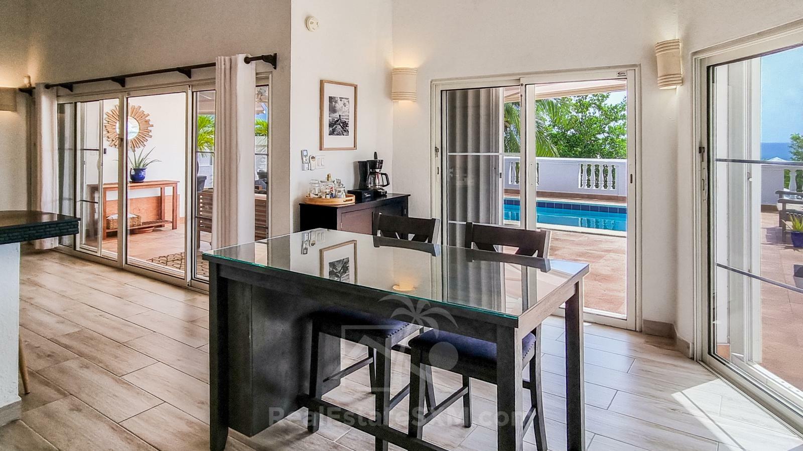 Caribbean Villa Domila for sale in St Maarten, Pelican Key. Ocean view & Sunsets. Rental income