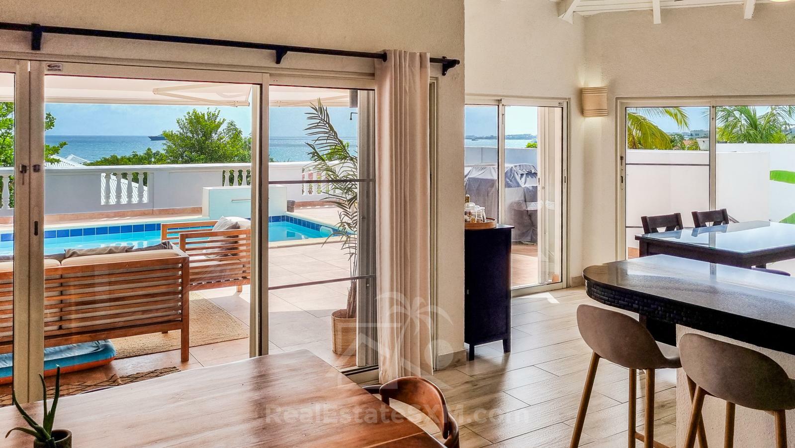 Caribbean Villa Domila for sale in St Maarten, Pelican Key. Ocean view & Sunsets. Rental income
