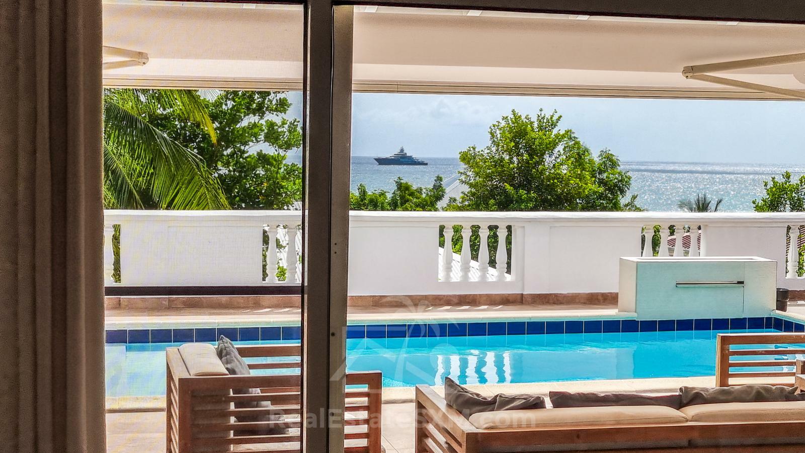 Caribbean Villa Domila for sale in St Maarten, Pelican Key. Ocean view & Sunsets. Rental income