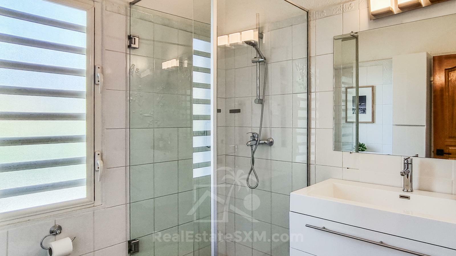 Caribbean Villa Domila for sale in St Maarten, Pelican Key. Ocean view & Sunsets. Rental income
