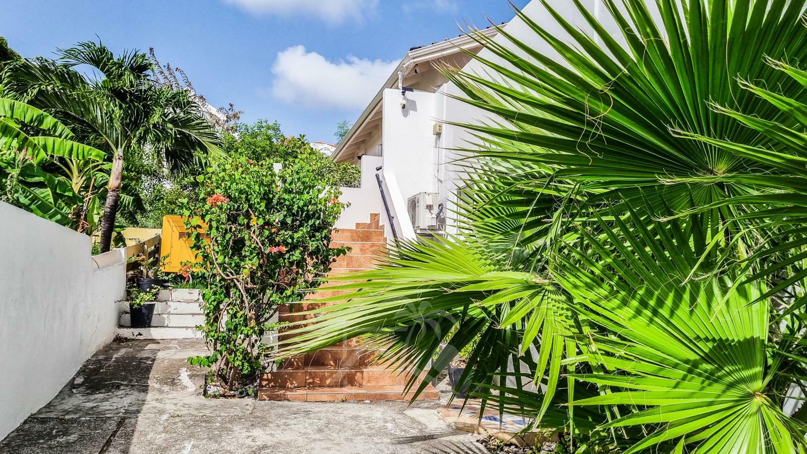 Caribbean Villa Domila for sale in St Maarten, Pelican Key. Ocean view & Sunsets. Rental income