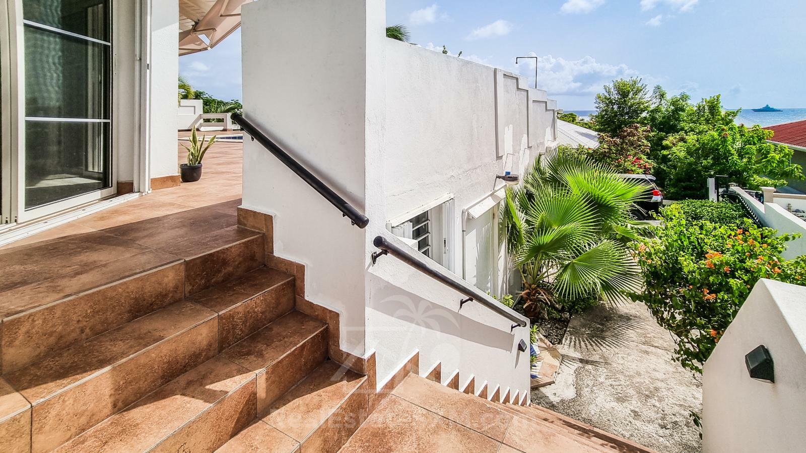 Caribbean Villa Domila for sale in St Maarten, Pelican Key. Ocean view & Sunsets. Rental income