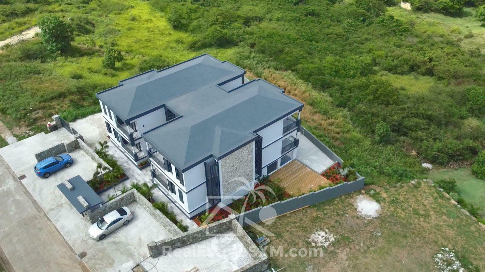 Investment Building for Sale SXM. Gated Community. Beautiful View. Generator and Cistern. Garage.