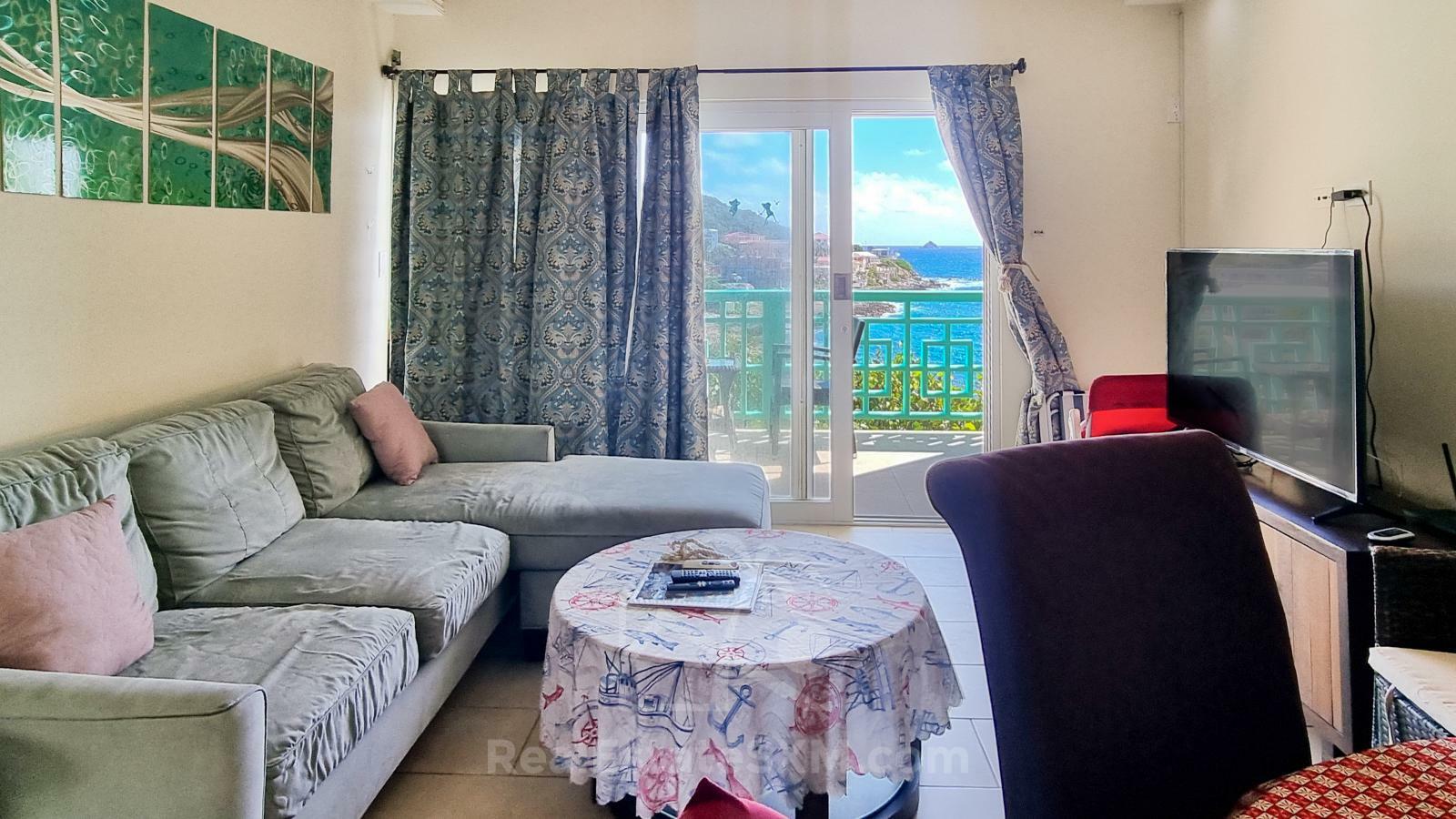 St Maarten home FOR SALE 2-bedroom condo Ocean-Front in Point Blanche. Swimming Pool. 