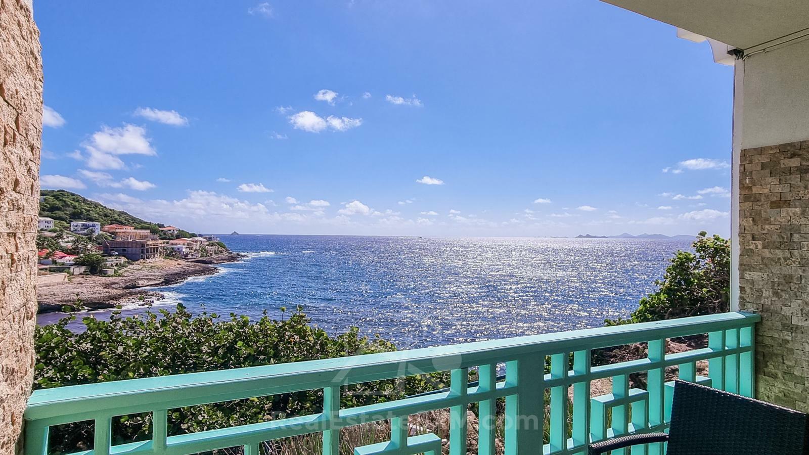 St Maarten home FOR SALE 2-bedroom condo Ocean-Front in Point Blanche. Swimming Pool. 