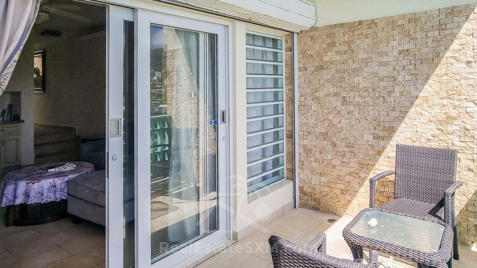 St Maarten home FOR SALE 2-bedroom condo Ocean-Front in Point Blanche. Swimming Pool. 